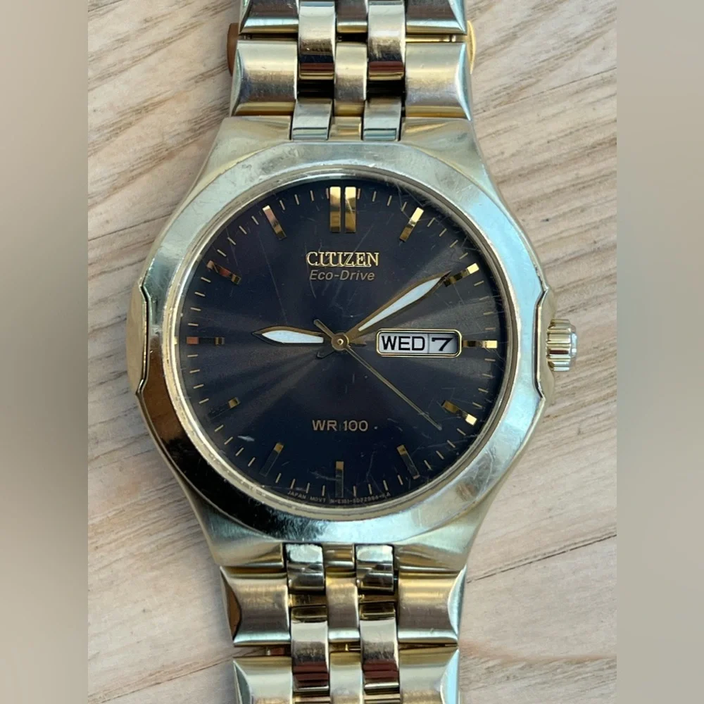 Citizen Eco-Drive Men’s Watch Dark Gray Dial Day Date Window Gold-Tone Bracelet